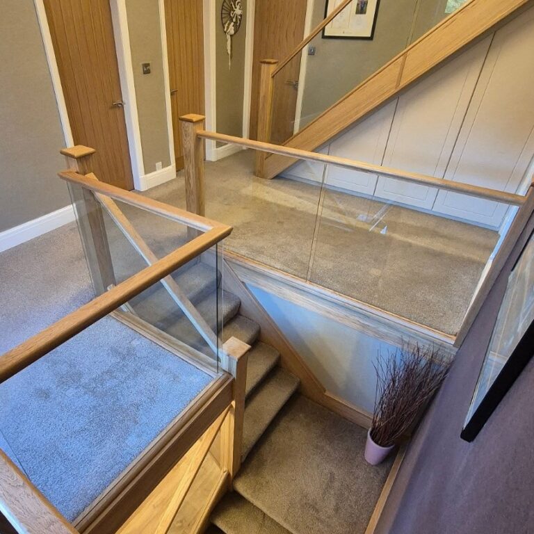 Glass & oak staircase renovation with oak handrails and clear glass panels