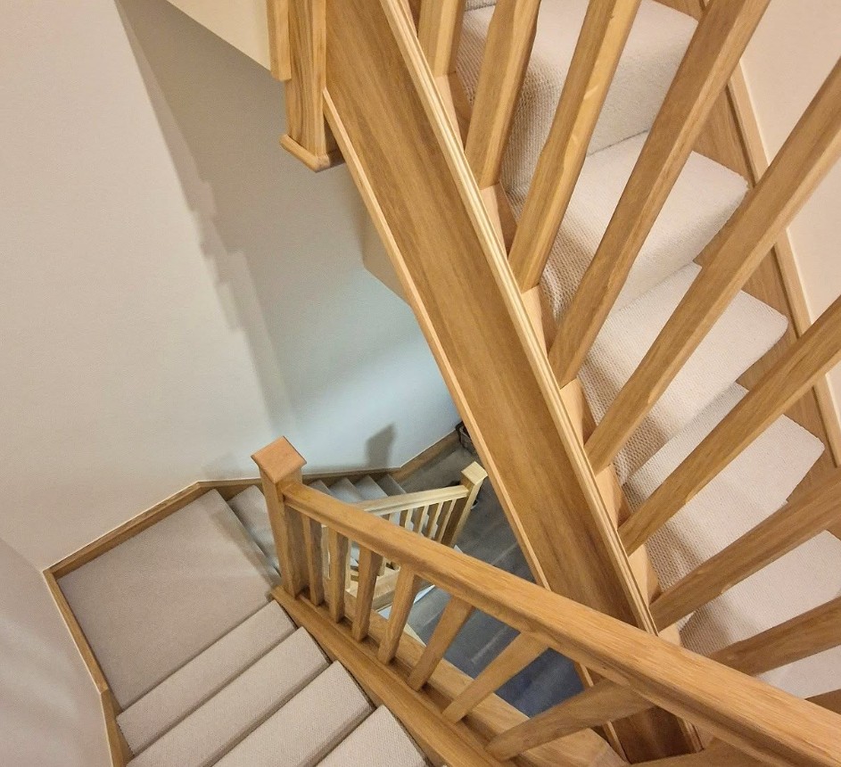 Oak staircase renovation with solid oak handrails, newel posts and spindles in Cheshire