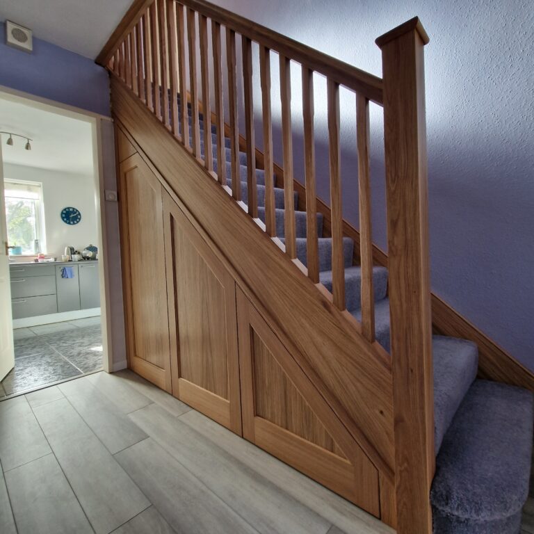 Fitted understairs storage maximising unused space in Bramhall