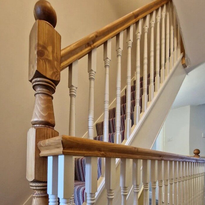 Traditional to modern staircase conversion with oak handrails